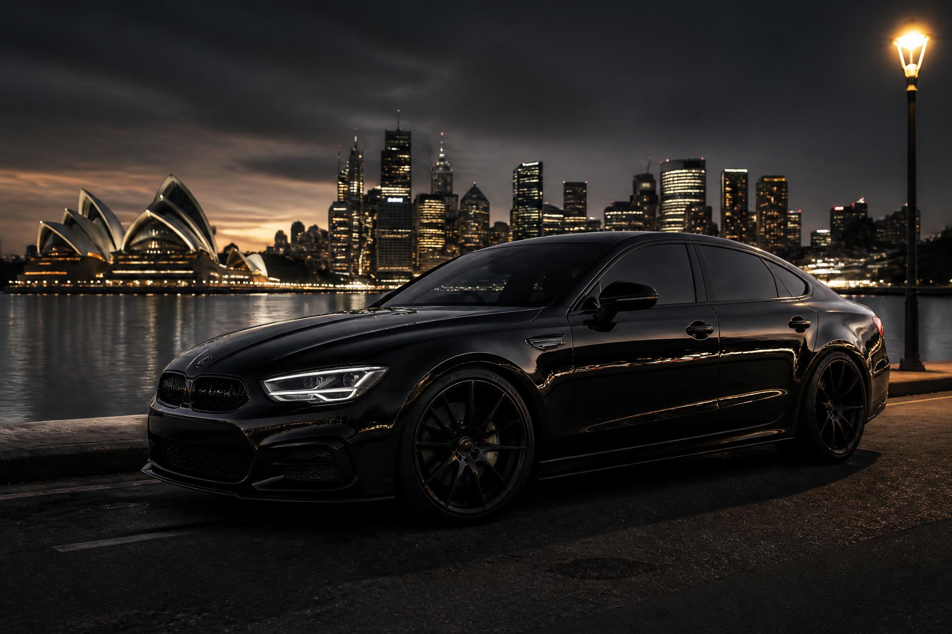 Black performance sedan with flawless paintwork detailed in Sydney at dusk